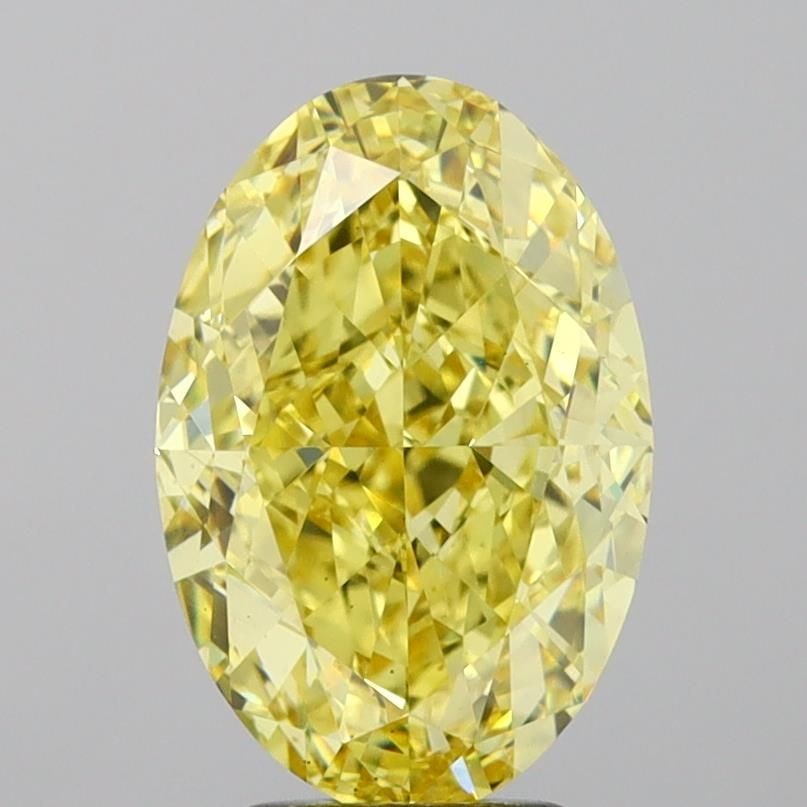 Loose Diamond - OVAL 5.57ct Fancy Vivid Yellow VS2: Loose Diamond - OVAL 5.57ct Fancy Vivid Yellow VS2 Source: This is a real non-mined Diamond that has been grown in a lab Shape: OVAL Carats: 5.57 Color: Fancy Vivid Yellow Certification: IGI Video:
