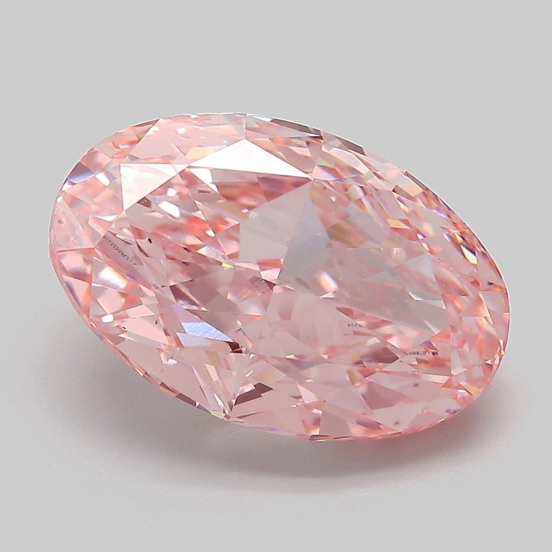 Loose Diamond - OVAL 7.1ct Fancy Vivid Pink VS2: Loose Diamond - OVAL 7.1ct Fancy Vivid Pink VS2 Source: This is a real non-mined Diamond that has been grown in a lab Shape: OVAL Carats: 7.1 Color: Fancy Vivid Pink Certification: IGI Video: Video