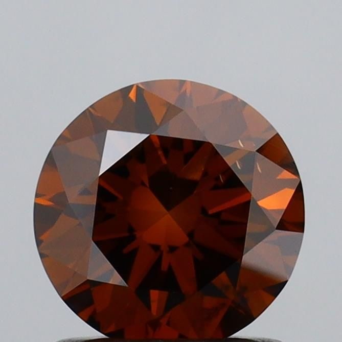 Loose Diamond - ROUND 1.01ct Fancy Deep Brown VS2: Loose Diamond - ROUND 1.01ct Fancy Deep Brown VS2 Source: This is a real non-mined Diamond that has been grown in a lab Shape: ROUND Carats: 1.01 Color: Fancy Deep Brown Certification: IGI Video: