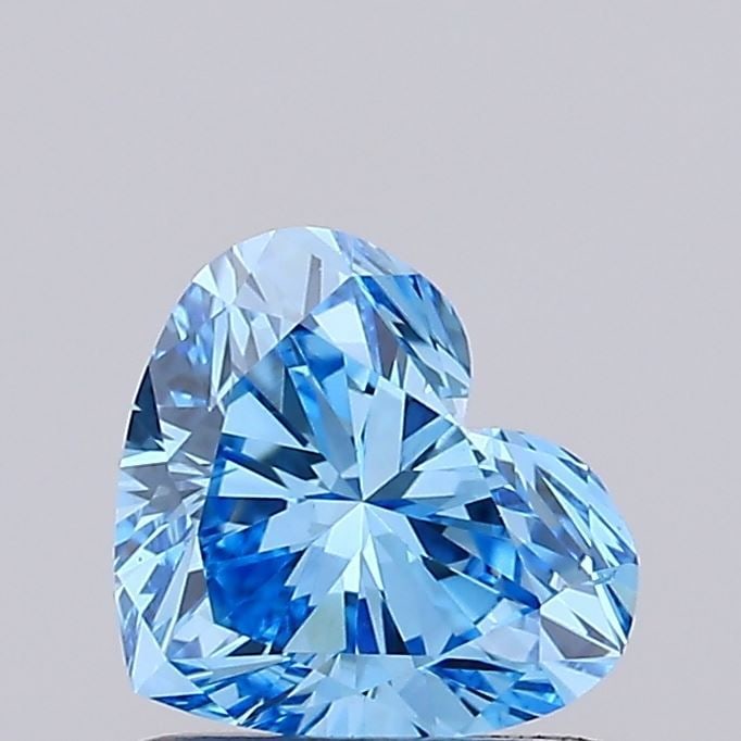 Loose Diamond - HEART 0.77ct Fancy Vivid Blue VS1: Loose Diamond - HEART 0.77ct Fancy Vivid Blue VS1 Source: This is a real non-mined Diamond that has been grown in a lab Shape: HEART Carats: 0.77 Color: Fancy Vivid Blue Certification: IGI Video: