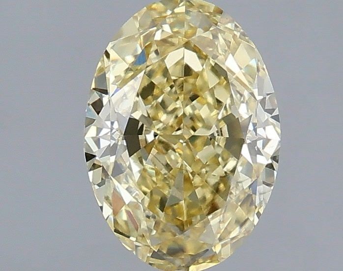 Loose Diamond - OVAL 1.59ct Fancy Intense Yellow VS2: Loose Diamond - OVAL 1.59ct Fancy Intense Yellow VS2 Source: This is a real non-mined Diamond that has been grown in a lab Shape: OVAL Carats: 1.59 Color: Fancy Intense Yellow Certification: IGI Video