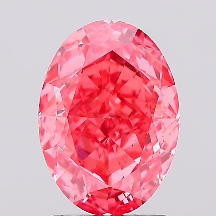 Loose Diamond - OVAL 2.16ct Fancy Vivid Pink SI1: Loose Diamond - OVAL 2.16ct Fancy Vivid Pink SI1 Source: This is a real non-mined Diamond that has been grown in a lab Shape: OVAL Carats: 2.16 Color: Fancy Vivid Pink Certification: IGI Video: