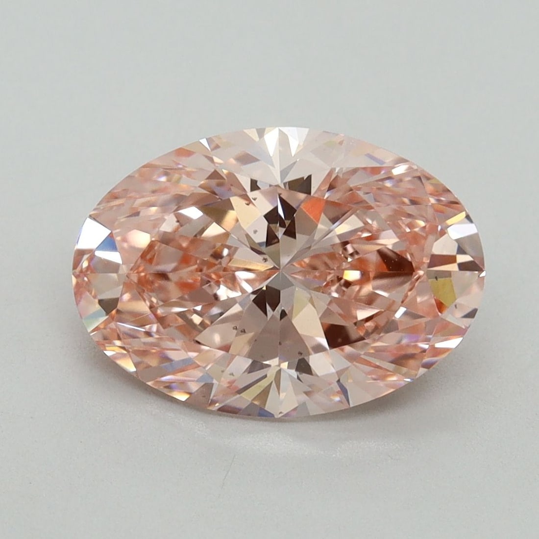 Loose Diamond - OVAL 3.08ct Fancy Vivid Pink VS2: Loose Diamond - OVAL 3.08ct Fancy Vivid Pink VS2 Source: This is a real non-mined Diamond that has been grown in a lab Shape: OVAL Carats: 3.08 Color: Fancy Vivid Pink Certification: IGI Video: