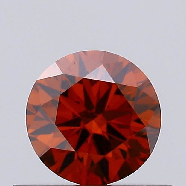 Loose Diamond - ROUND 0.36ct Fancy Deep Orange VS1: Loose Diamond - ROUND 0.36ct Fancy Deep Orange VS1 Source: This is a real non-mined Diamond that has been grown in a lab Shape: ROUND Carats: 0.36 Color: Fancy Deep Orange Certification: IGI Video: