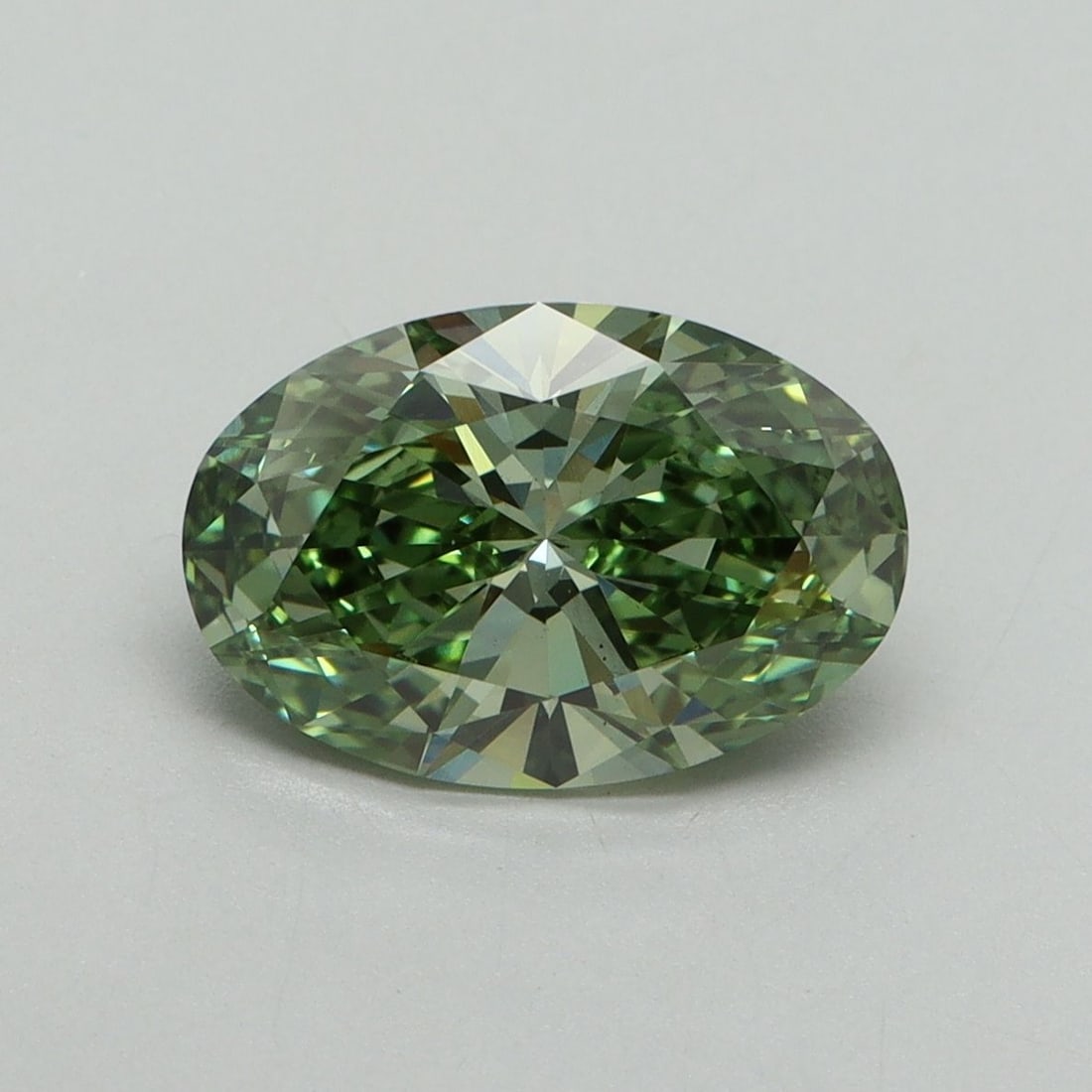 Loose Diamond - OVAL 2.01ct Fancy Vivid Green VS1: Loose Diamond - OVAL 2.01ct Fancy Vivid Green VS1 Source: This is a real non-mined Diamond that has been grown in a lab Shape: OVAL Carats: 2.01 Color: Fancy Vivid Green Certification: IGI Video:
