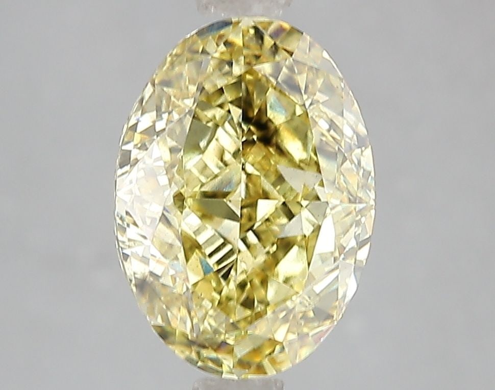 Loose Diamond - OVAL 3.08ct Fancy Vivid Yellow SI1: Loose Diamond - OVAL 3.08ct Fancy Vivid Yellow SI1 Source: This is a real non-mined Diamond that has been grown in a lab Shape: OVAL Carats: 3.08 Color: Fancy Vivid Yellow Certification: IGI Video: