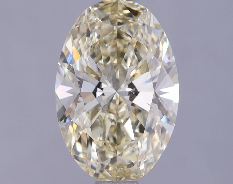 Loose Diamond - OVAL 1.14ct Light Yellow VS1: Loose Diamond - OVAL 1.14ct Light Yellow VS1 Source: This is a real non-mined Diamond that has been grown in a lab Shape: OVAL Carats: 1.14 Color: Light Yellow Certification: IGI Video: