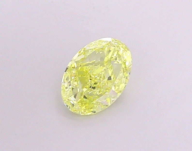 Loose Diamond - OVAL 1.25ct Fancy Vivid Yellow VS1: Loose Diamond - OVAL 1.25ct Fancy Vivid Yellow VS1 Source: This is a real non-mined Diamond that has been grown in a lab Shape: OVAL Carats: 1.25 Color: Fancy Vivid Yellow Certification: IGI Video:
