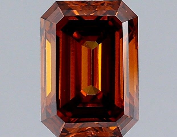 Loose Diamond - EMERALD 1.09ct Fancy Orangey Brown VS1: Loose Diamond - EMERALD 1.09ct Fancy Orangey Brown VS1 Source: This is a real non-mined Diamond that has been grown in a lab Shape: EMERALD Carats: 1.09 Color: Fancy Orangey Brown Certification: IGI V