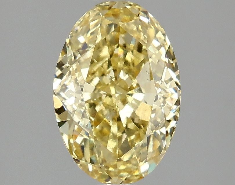 Loose Diamond - OVAL 2.1ct Fancy Vivid Yellow VS2: Loose Diamond - OVAL 2.1ct Fancy Vivid Yellow VS2 Source: This is a real non-mined Diamond that has been grown in a lab Shape: OVAL Carats: 2.1 Color: Fancy Vivid Yellow Certification: IGI Video: