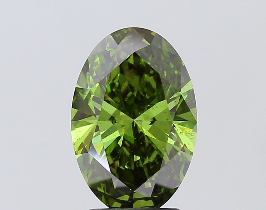 Loose Diamond - OVAL 3.0ct Fancy Vivid Green SI2: Loose Diamond - OVAL 3.0ct Fancy Vivid Green SI2 Source: This is a real non-mined Diamond that has been grown in a lab Shape: OVAL Carats: 3.0 Color: Fancy Vivid Green Certification: IGI Additional im