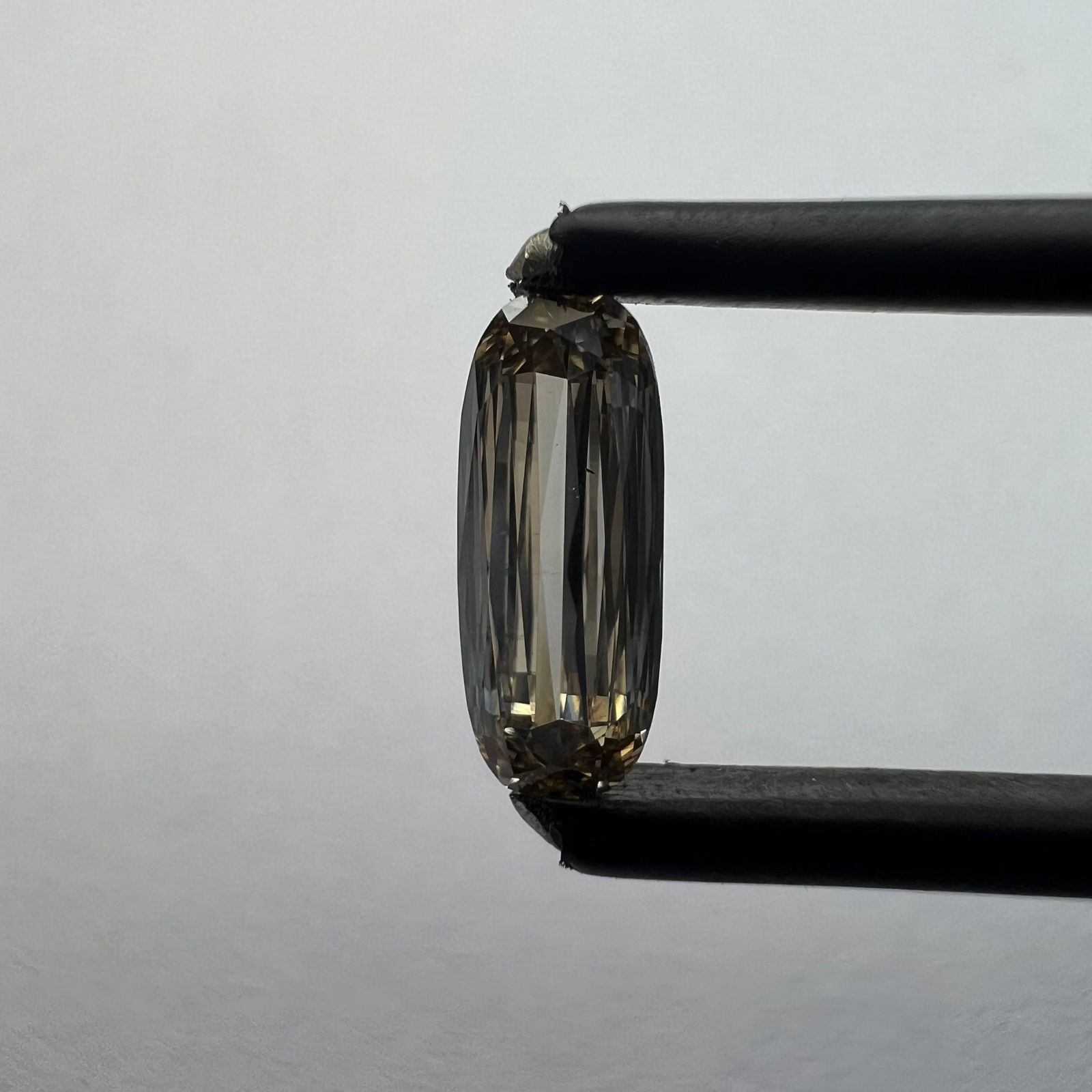 Loose Diamond - CUSHION BRILLIANT 0.57ct Brown VS2: Loose Diamond - CUSHION BRILLIANT 0.57ct Brown VS2 Source: This is a real non-mined Diamond that has been grown in a lab Shape: CUSHION BRILLIANT Carats: 0.57 Color: Brown Certification: NONE Addition