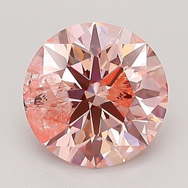 Loose Diamond - ROUND 1.34ct Fancy Pink I2: Loose Diamond - ROUND 1.34ct Fancy Pink I2 Source: This is a real non-mined Diamond that has been grown in a lab Shape: ROUND Carats: 1.34 Color: Fancy Pink Certification: IGI Video: