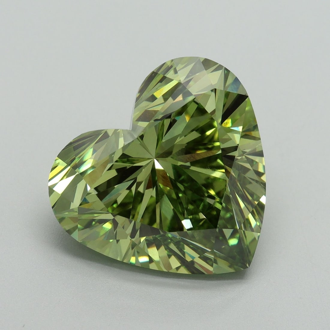 Loose Diamond - HEART 9.13ct Fancy Vivid Green VS1: Loose Diamond - HEART 9.13ct Fancy Vivid Green VS1 Source: This is a real non-mined Diamond that has been grown in a lab Shape: HEART Carats: 9.13 Color: Fancy Vivid Green Certification: IGI Video: