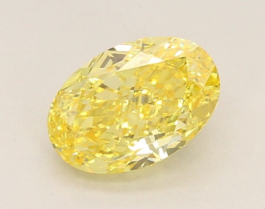 Loose Diamond - OVAL 2.03ct Fancy Vivid Yellow VS1: Loose Diamond - OVAL 2.03ct Fancy Vivid Yellow VS1 Source: This is a real non-mined Diamond that has been grown in a lab Shape: OVAL Carats: 2.03 Color: Fancy Vivid Yellow Certification: IGI Video: