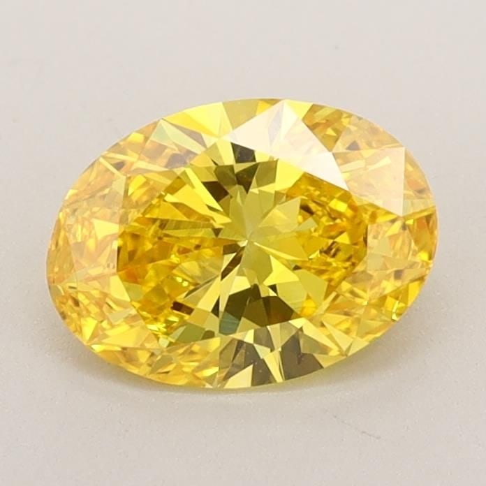 Loose Diamond - OVAL 0.88ct Fancy Vivid Yellow VS1: Loose Diamond - OVAL 0.88ct Fancy Vivid Yellow VS1 Source: This is a real non-mined Diamond that has been grown in a lab Shape: OVAL Carats: 0.88 Color: Fancy Vivid Yellow Certification: IGI Video:
