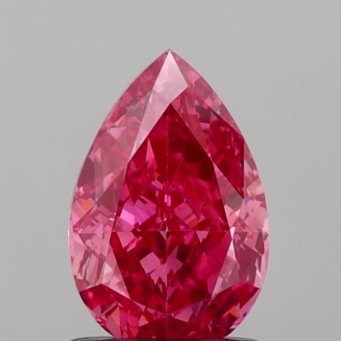 Loose Diamond - PEAR 1.08ct Fancy Vivid Pink VS2: Loose Diamond - PEAR 1.08ct Fancy Vivid Pink VS2 Source: This is a real non-mined Diamond that has been grown in a lab Shape: PEAR Carats: 1.08 Color: Fancy Vivid Pink Certification: IGI Video: