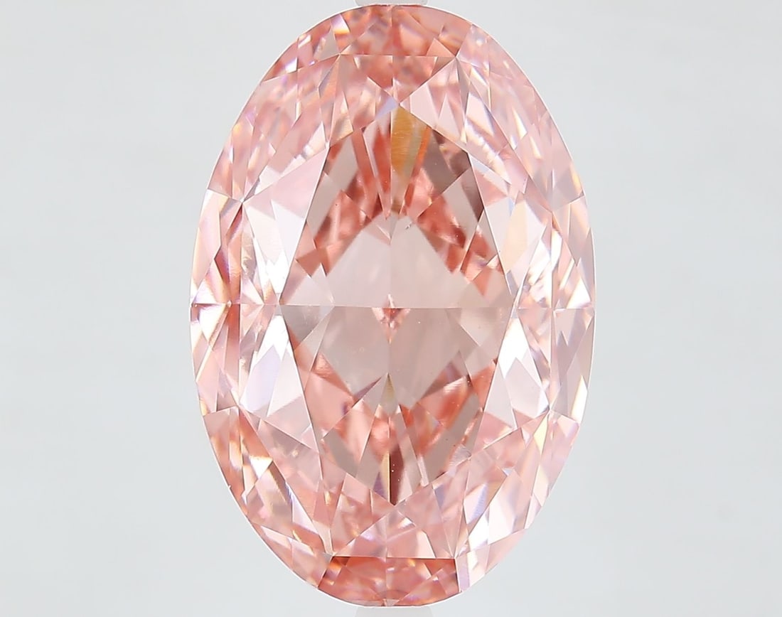 Loose Diamond - OVAL 13.13ct Fancy Vivid Pink VVS2: Loose Diamond - OVAL 13.13ct Fancy Vivid Pink VVS2 Source: This is a real non-mined Diamond that has been grown in a lab Shape: OVAL Carats: 13.13 Color: Fancy Vivid Pink Certification: IGI Video: