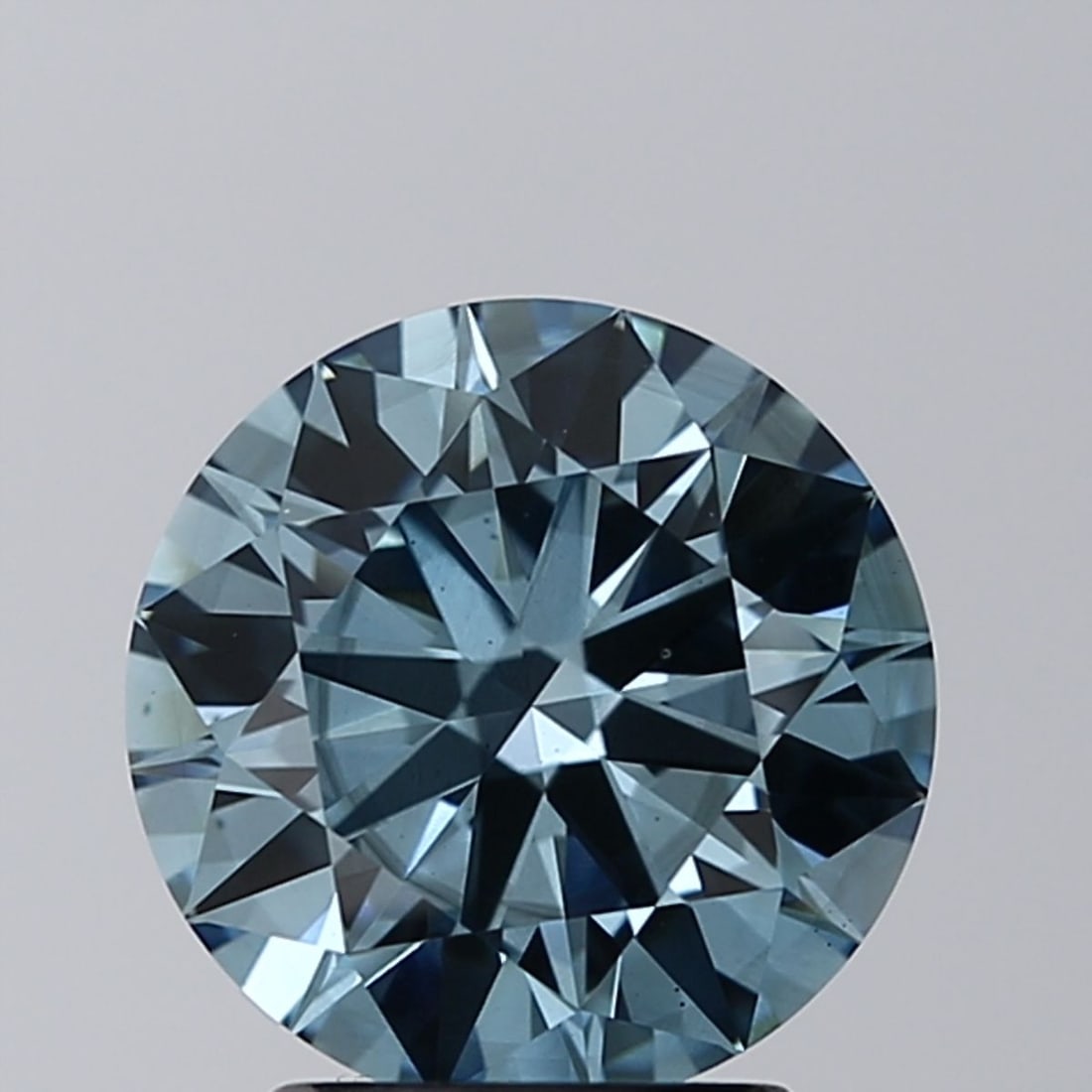 Ideal Loose Diamond - ROUND 2.31ct Fancy Vivid Blue SI1: Ideal Loose Diamond - ROUND 2.31ct Fancy Vivid Blue SI1 Source: This is a real non-mined Diamond that has been grown in a lab Shape: ROUND Carats: 2.31 Color: Fancy Vivid Blue Certification: IGI Video