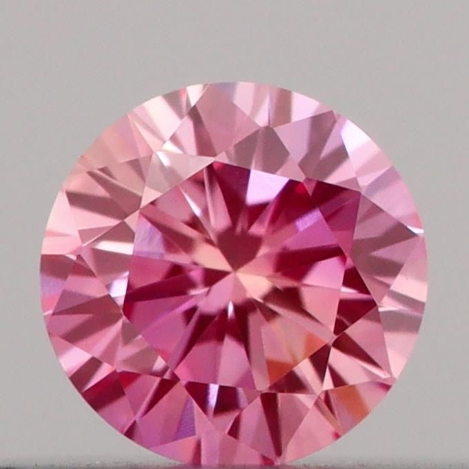 Loose Diamond - ROUND 0.18ct Fancy Vivid Pink VVS2: Loose Diamond - ROUND 0.18ct Fancy Vivid Pink VVS2 Source: This is a real non-mined Diamond that has been grown in a lab Shape: ROUND Carats: 0.18 Color: Fancy Vivid Pink Certification: IGI Video: