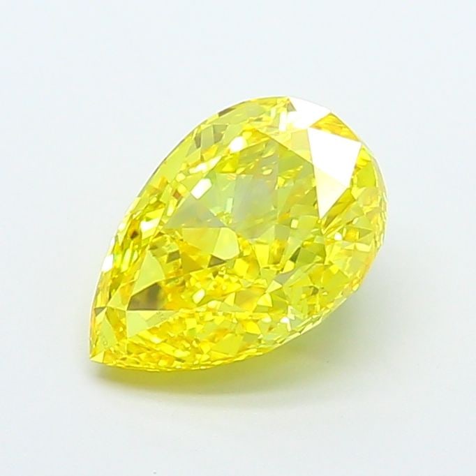 Loose Diamond - PEAR 3.1ct Fancy Vivid Yellow VS1: Loose Diamond - PEAR 3.1ct Fancy Vivid Yellow VS1 Source: This is a real non-mined Diamond that has been grown in a lab Shape: PEAR Carats: 3.1 Color: Fancy Vivid Yellow Certification: IGI Video: