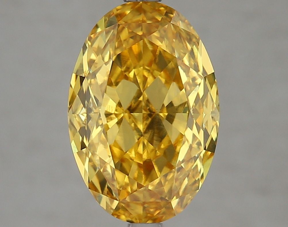 Loose Diamond - OVAL 5.05ct Fancy Vivid Yellow VVS2: Loose Diamond - OVAL 5.05ct Fancy Vivid Yellow VVS2 Source: This is a real non-mined Diamond that has been grown in a lab Shape: OVAL Carats: 5.05 Color: Fancy Vivid Yellow Certification: IGI Video: