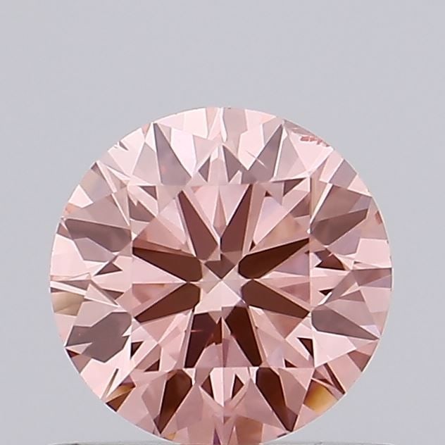 Ideal Loose Diamond - ROUND 0.63ct Fancy Vivid Pink SI1: Ideal Loose Diamond - ROUND 0.63ct Fancy Vivid Pink SI1 Source: This is a real non-mined Diamond that has been grown in a lab Shape: ROUND Carats: 0.63 Color: Fancy Vivid Pink Certification: IGI Video