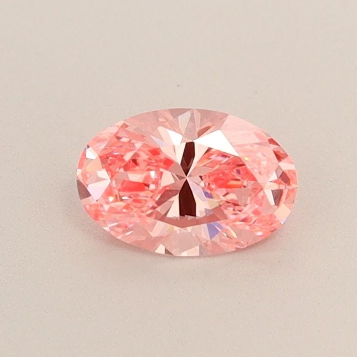 Loose Diamond - OVAL 0.43ct Fancy Vivid Pink VS1: Loose Diamond - OVAL 0.43ct Fancy Vivid Pink VS1 Source: This is a real non-mined Diamond that has been grown in a lab Shape: OVAL Carats: 0.43 Color: Fancy Vivid Pink Certification: IGI Video: