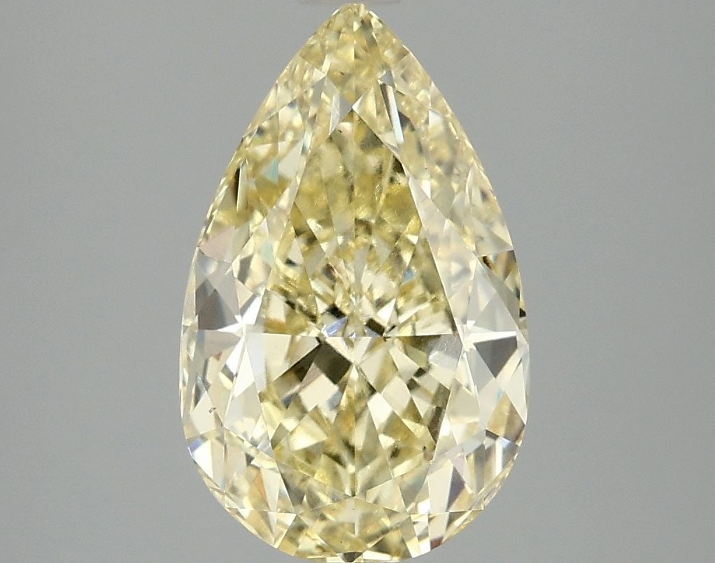 Loose Diamond - PEAR 3.07ct Fancy Vivid Yellow VS1: Loose Diamond - PEAR 3.07ct Fancy Vivid Yellow VS1 Source: This is a real non-mined Diamond that has been grown in a lab Shape: PEAR Carats: 3.07 Color: Fancy Vivid Yellow Certification: IGI Video: