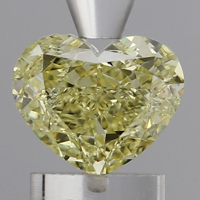 Loose Diamond - HEART 1.42ct Fancy Intense Yellow VS1: Loose Diamond - HEART 1.42ct Fancy Intense Yellow VS1 Source: This is a real non-mined Diamond that has been grown in a lab Shape: HEART Carats: 1.42 Color: Fancy Intense Yellow Certification: IGI Vid