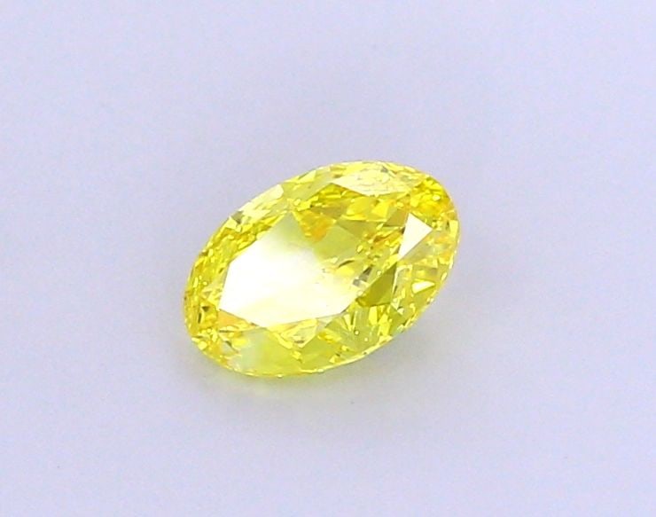 Loose Diamond - OVAL 1.1ct Fancy Vivid Yellow VVS2: Loose Diamond - OVAL 1.1ct Fancy Vivid Yellow VVS2 Source: This is a real non-mined Diamond that has been grown in a lab Shape: OVAL Carats: 1.1 Color: Fancy Vivid Yellow Certification: IGI Video: