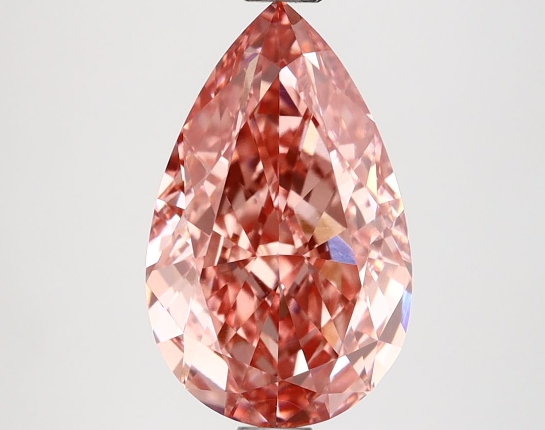 Loose Diamond - PEAR 3.06ct Fancy Vivid Pink VVS2: Loose Diamond - PEAR 3.06ct Fancy Vivid Pink VVS2 Source: This is a real non-mined Diamond that has been grown in a lab Shape: PEAR Carats: 3.06 Color: Fancy Vivid Pink Certification: IGI Video: