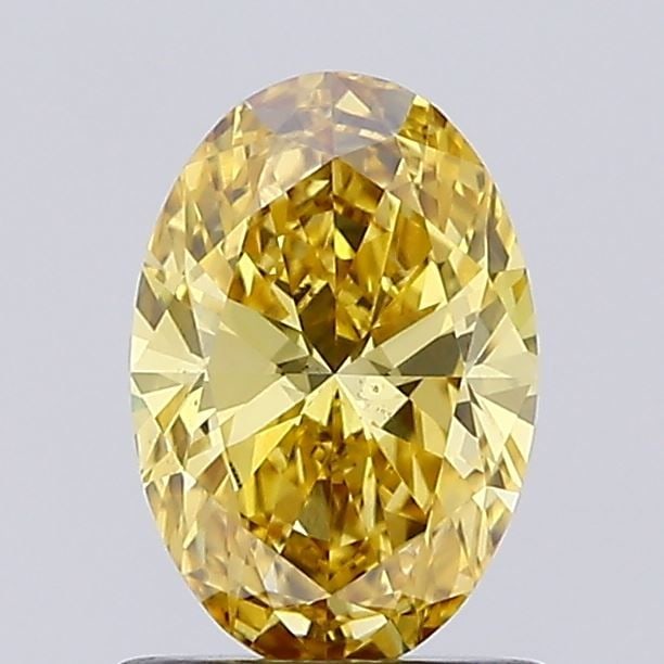 Loose Diamond - OVAL 0.94ct Fancy Vivid Yellow VS2: Loose Diamond - OVAL 0.94ct Fancy Vivid Yellow VS2 Source: This is a real non-mined Diamond that has been grown in a lab Shape: OVAL Carats: 0.94 Color: Fancy Vivid Yellow Certification: IGI Video:
