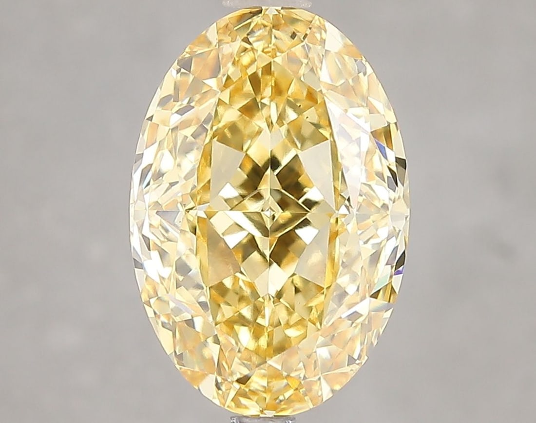 Loose Diamond - OVAL 4.85ct Fancy Vivid Yellow VS1: Loose Diamond - OVAL 4.85ct Fancy Vivid Yellow VS1 Source: This is a real non-mined Diamond that has been grown in a lab Shape: OVAL Carats: 4.85 Color: Fancy Vivid Yellow Certification: IGI Video: