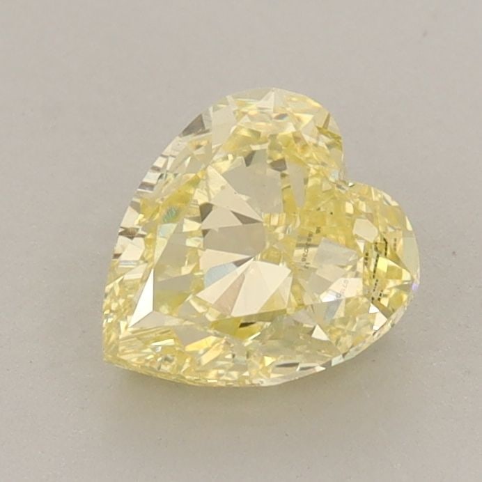 Loose Diamond - HEART 1.04ct Fancy Intense Yellow VS1: Loose Diamond - HEART 1.04ct Fancy Intense Yellow VS1 Source: This is a real non-mined Diamond that has been grown in a lab Shape: HEART Carats: 1.04 Color: Fancy Intense Yellow Certification: IGI