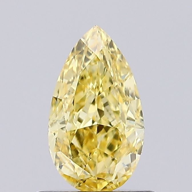 Loose Diamond - PEAR 0.7ct Fancy Vivid Yellow VS2: Loose Diamond - PEAR 0.7ct Fancy Vivid Yellow VS2 Source: This is a real non-mined Diamond that has been grown in a lab Shape: PEAR Carats: 0.7 Color: Fancy Vivid Yellow Certification: IGI Video: