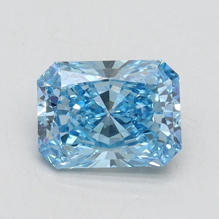 Loose Diamond - RADIANT 0.99ct Fancy Vivid Blue VS1: Loose Diamond - RADIANT 0.99ct Fancy Vivid Blue VS1 Source: This is a real non-mined Diamond that has been grown in a lab Shape: RADIANT Carats: 0.99 Color: Fancy Vivid Blue Certification: IGI