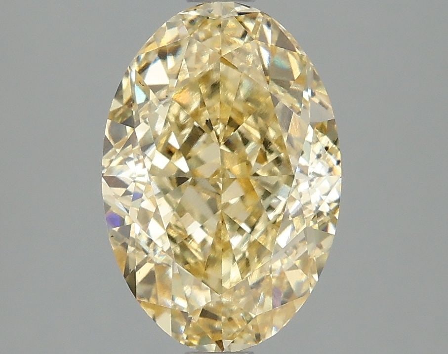 Loose Diamond - OVAL 3.02ct Fancy Intense Yellow VS2: Loose Diamond - OVAL 3.02ct Fancy Intense Yellow VS2 Source: This is a real non-mined Diamond that has been grown in a lab Shape: OVAL Carats: 3.02 Color: Fancy Intense Yellow Certification: IGI