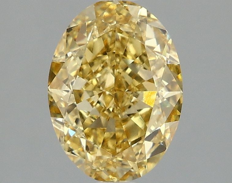 Loose Diamond - OVAL 2.1ct Fancy Vivid Yellow VVS2: Loose Diamond - OVAL 2.1ct Fancy Vivid Yellow VVS2 Source: This is a real non-mined Diamond that has been grown in a lab Shape: OVAL Carats: 2.1 Color: Fancy Vivid Yellow Certification: IGI Video: