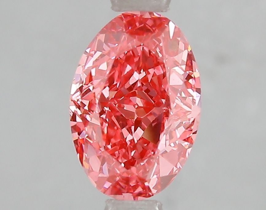 Loose Diamond - OVAL 1.6ct Fancy Vivid Pink VS1: Loose Diamond - OVAL 1.6ct Fancy Vivid Pink VS1 Source: This is a real non-mined Diamond that has been grown in a lab Shape: OVAL Carats: 1.6 Color: Fancy Vivid Pink Certification: IGI Video: