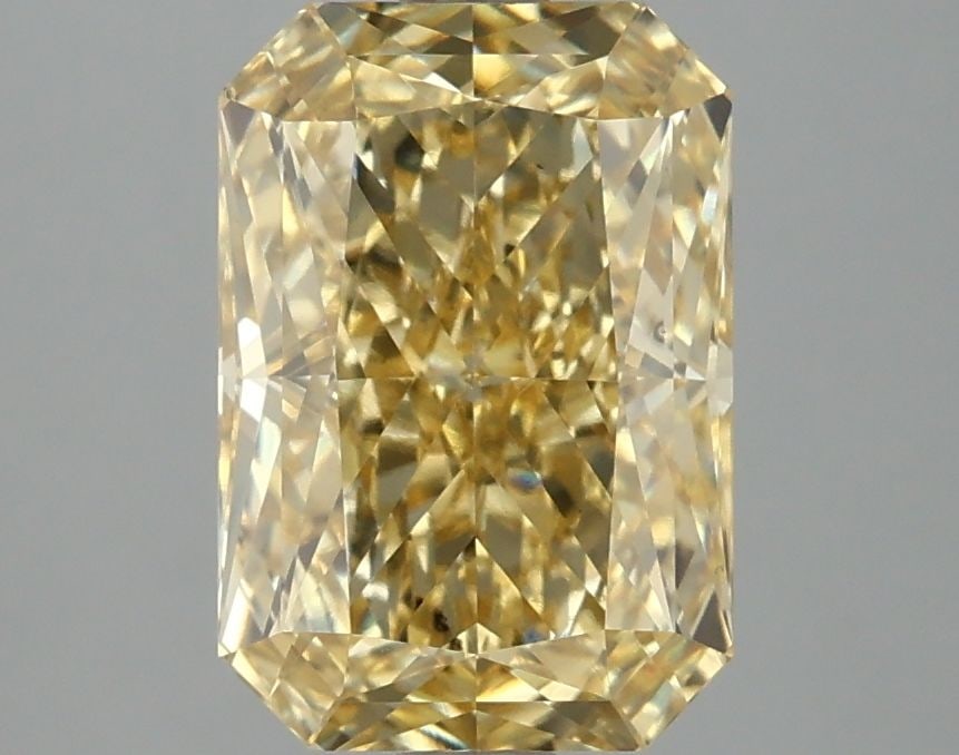 Loose Diamond - RADIANT 2.98ct Fancy Vivid Yellow VS1: Loose Diamond - RADIANT 2.98ct Fancy Vivid Yellow VS1 Source: This is a real non-mined Diamond that has been grown in a lab Shape: RADIANT Carats: 2.98 Color: Fancy Vivid Yellow Certification: IGI Vid