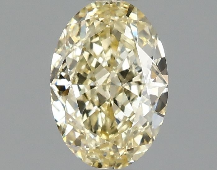 Loose Diamond - OVAL 1.09ct Fancy Yellow VS1: Loose Diamond - OVAL 1.09ct Fancy Yellow VS1 Source: This is a real non-mined Diamond that has been grown in a lab Shape: OVAL Carats: 1.09 Color: Fancy Yellow Certification: IGI Video: