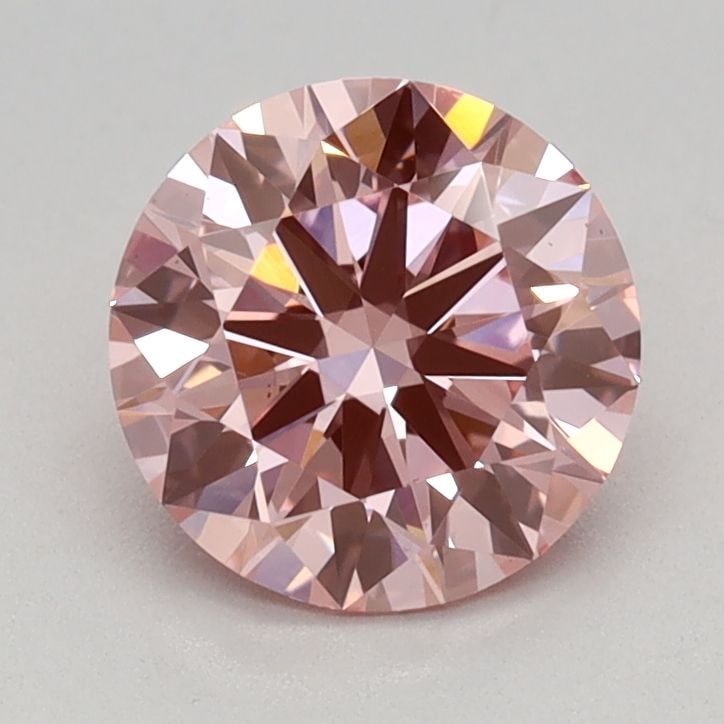 Ideal Loose Diamond - ROUND 0.93ct Fancy Vivid Pink VS1: Ideal Loose Diamond - ROUND 0.93ct Fancy Vivid Pink VS1 Source: This is a real non-mined Diamond that has been grown in a lab Shape: ROUND Carats: 0.93 Color: Fancy Vivid Pink Certification: IGI
