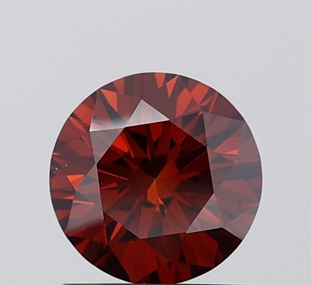 Loose Diamond - ROUND 1.19ct Fancy Deep Brown VS2: Loose Diamond - ROUND 1.19ct Fancy Deep Brown VS2 Source: This is a real non-mined Diamond that has been grown in a lab Shape: ROUND Carats: 1.19 Color: Fancy Deep Brown Certification: IGI Additional