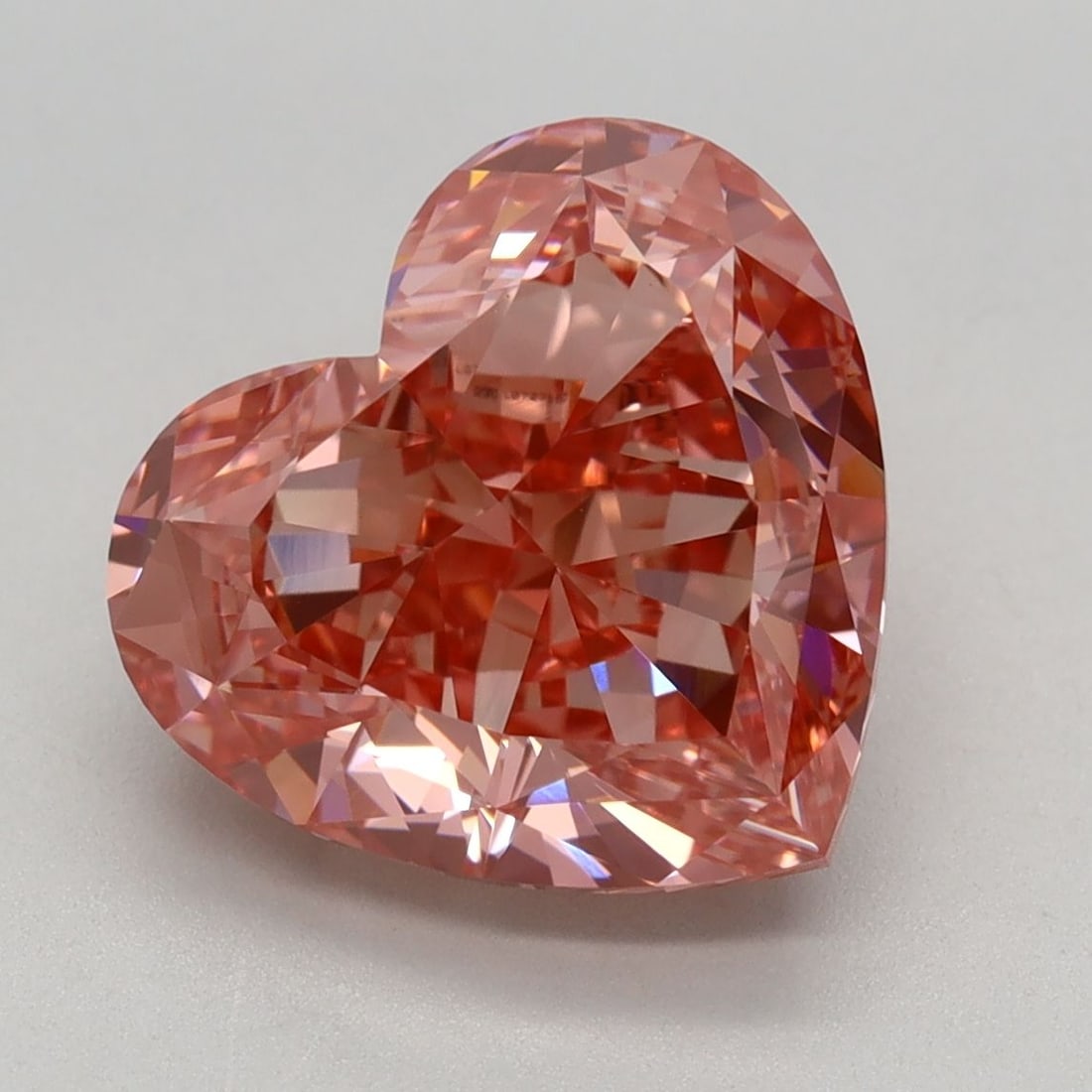 Loose Diamond - HEART 4.23ct Fancy Vivid Pink VVS2: Loose Diamond - HEART 4.23ct Fancy Vivid Pink VVS2 Source: This is a real non-mined Diamond that has been grown in a lab Shape: HEART Carats: 4.23 Color: Fancy Vivid Pink Certification: IGI Video: