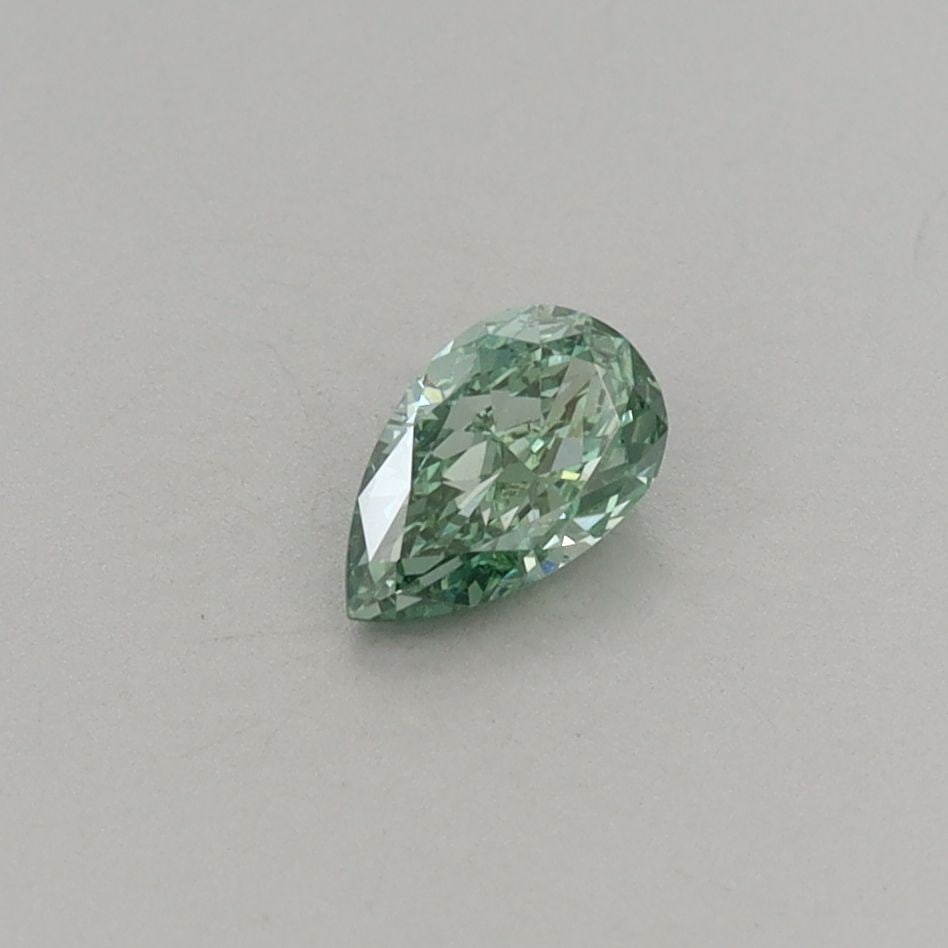 Loose Diamond - PEAR 0.31ct Fancy Vivid Green VS2: Loose Diamond - PEAR 0.31ct Fancy Vivid Green VS2 Source: This is a real non-mined Diamond that has been grown in a lab Shape: PEAR Carats: 0.31 Color: Fancy Vivid Green Certification: IGI Video: