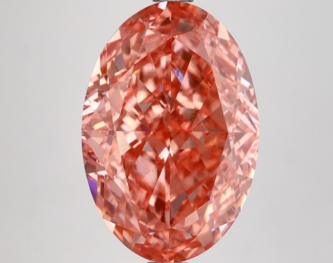 Loose Diamond - OVAL 5.09ct Fancy Vivid Pink VS2: Loose Diamond - OVAL 5.09ct Fancy Vivid Pink VS2 Source: This is a real non-mined Diamond that has been grown in a lab Shape: OVAL Carats: 5.09 Color: Fancy Vivid Pink Certification: IGI Video: