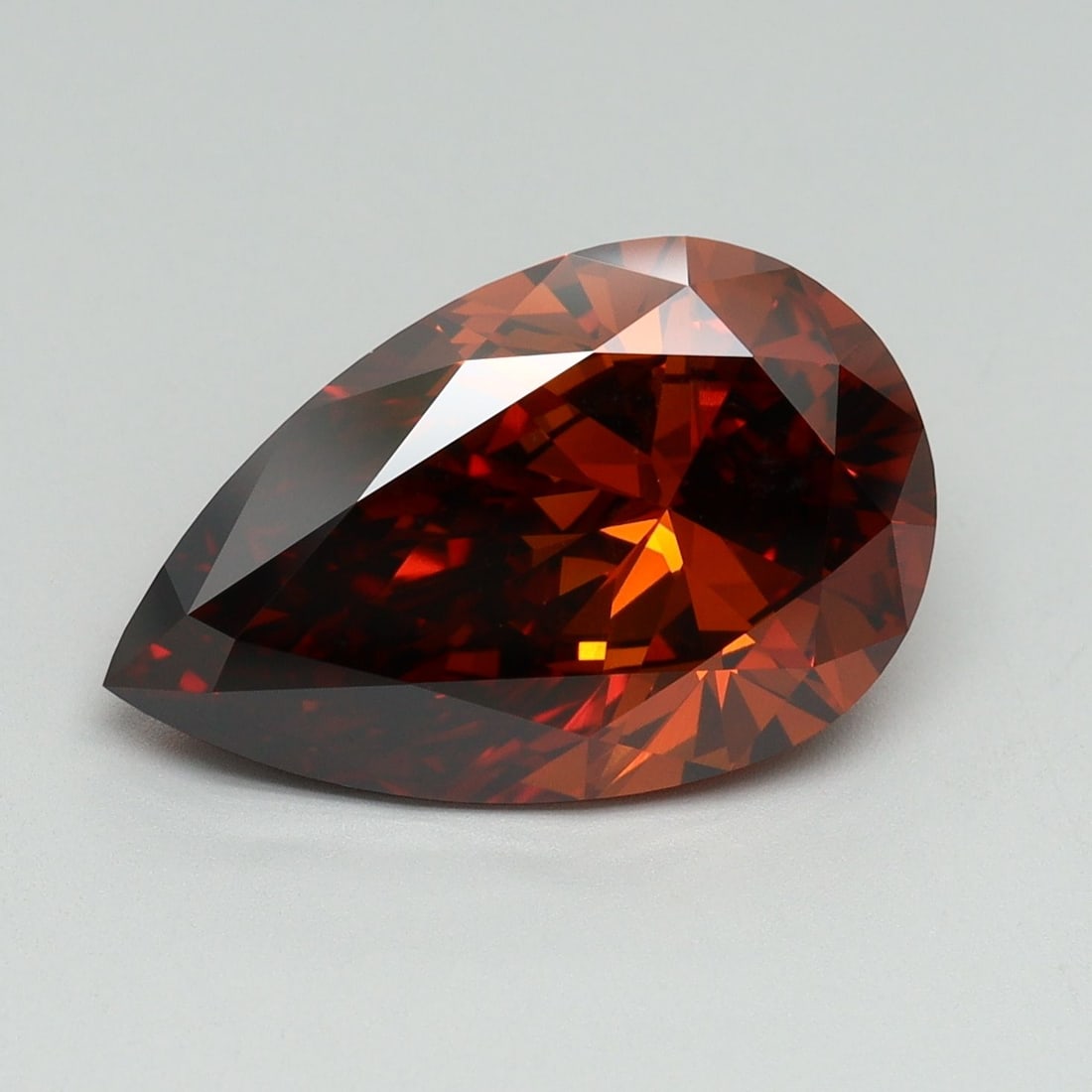 Loose Diamond - PEAR 5.17ct Fancy Deep Orange VVS2: Loose Diamond - PEAR 5.17ct Fancy Deep Orange VVS2 Source: This is a real non-mined Diamond that has been grown in a lab Shape: PEAR Carats: 5.17 Color: Fancy Deep Orange Certification: IGI Video:
