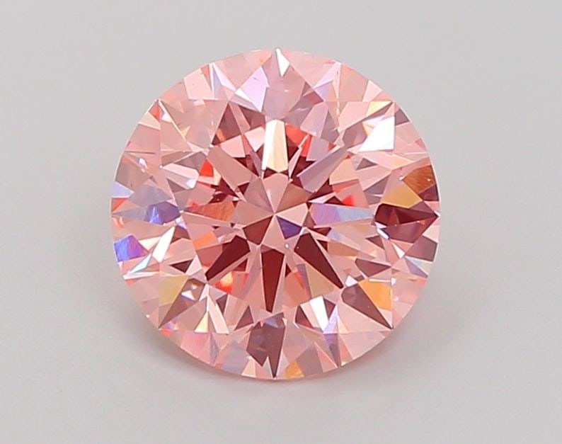 Ideal Loose Diamond - ROUND 2.53ct Fancy Vivid Pink VS1: Ideal Loose Diamond - ROUND 2.53ct Fancy Vivid Pink VS1 Source: This is a real non-mined Diamond that has been grown in a lab Shape: ROUND Carats: 2.53 Color: Fancy Vivid Pink Certification: IGI Video
