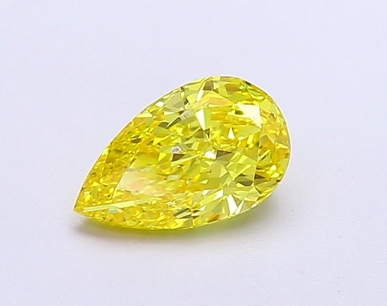 Loose Diamond - PEAR 1.0ct Fancy Vivid Yellow VS1: Loose Diamond - PEAR 1.0ct Fancy Vivid Yellow VS1 Source: This is a real non-mined Diamond that has been grown in a lab Shape: PEAR Carats: 1.0 Color: Fancy Vivid Yellow Certification: IGI Video: